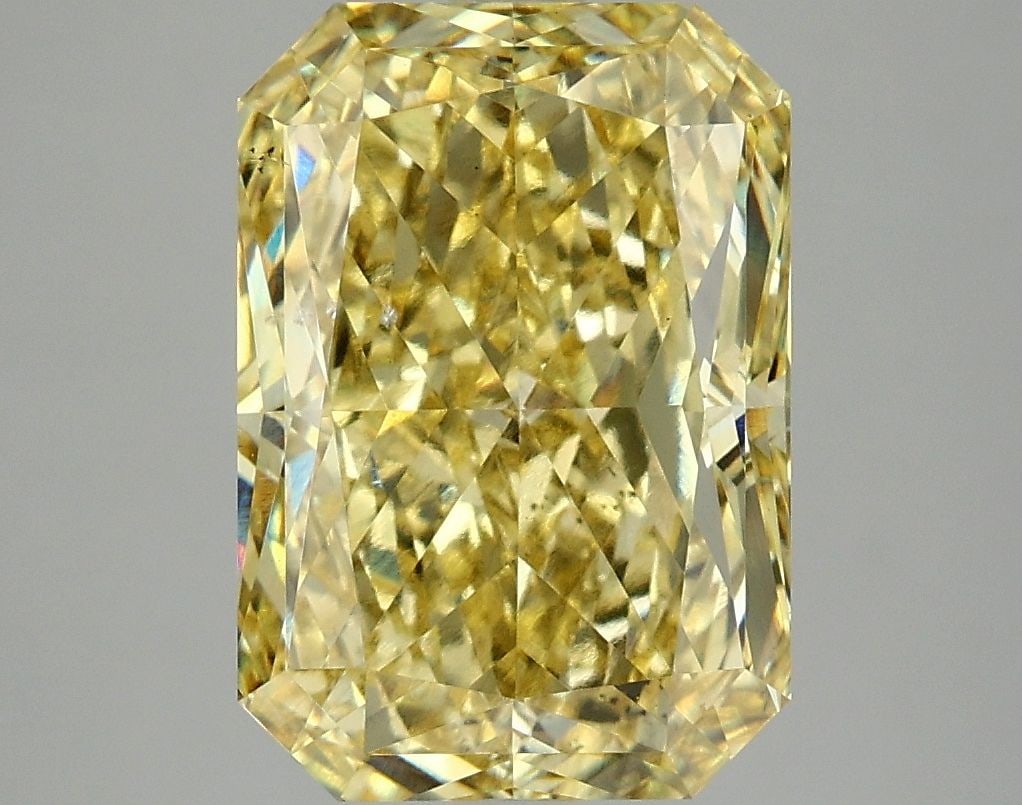 Loose Diamond - RADIANT 5.04ct Fancy Vivid Yellow VS2: Loose Diamond - RADIANT 5.04ct Fancy Vivid Yellow VS2 Source: This is a real non-mined Diamond that has been grown in a lab Shape: RADIANT Carats: 5.04 Color: Fancy Vivid Yellow Certification: IGI Vid