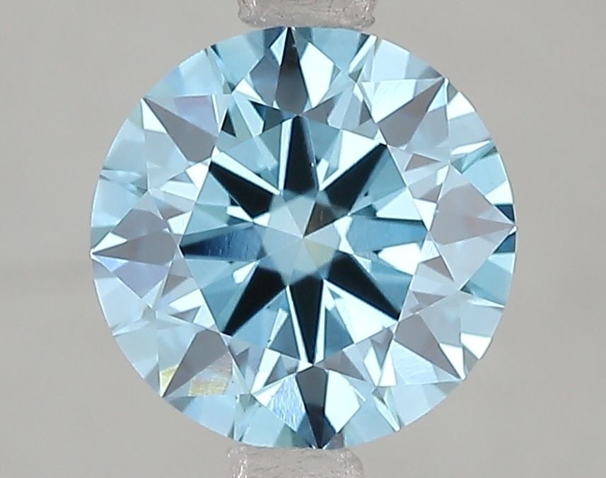 Ideal Loose Diamond - ROUND 2.1ct Fancy Vivid Blue VS1: Ideal Loose Diamond - ROUND 2.1ct Fancy Vivid Blue VS1 Source: This is a real non-mined Diamond that has been grown in a lab Shape: ROUND Carats: 2.1 Color: Fancy Vivid Blue Certification: IGI Video: