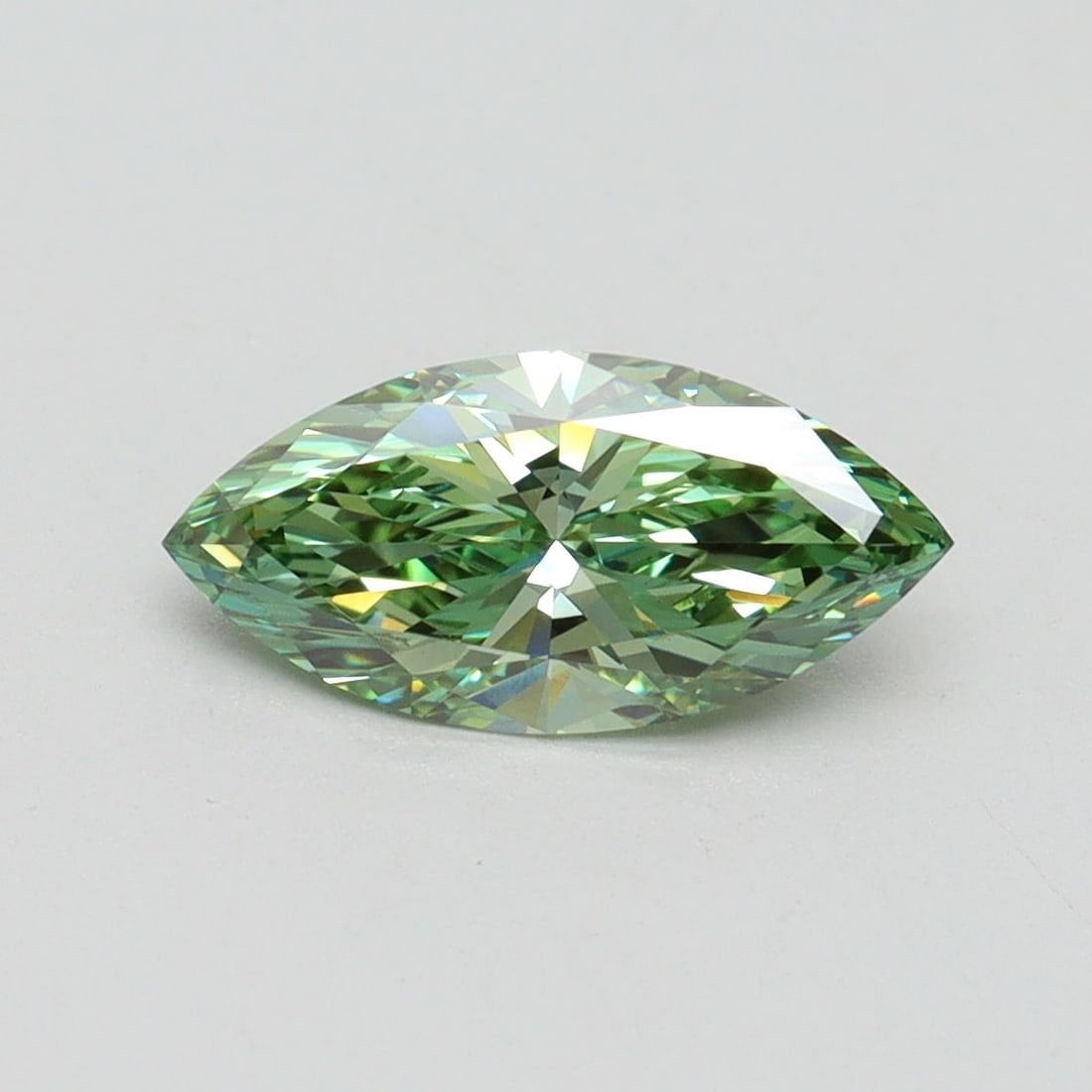 Loose Diamond - MARQUISE 1.03ct Fancy Vivid Green VS1: Loose Diamond - MARQUISE 1.03ct Fancy Vivid Green VS1 Source: This is a real non-mined Diamond that has been grown in a lab Shape: MARQUISE Carats: 1.03 Color: Fancy Vivid Green Certification: IGI Vid