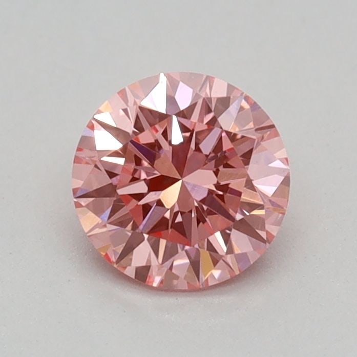 Loose Diamond - ROUND 0.36ct Fancy Vivid Pink VS1: Loose Diamond - ROUND 0.36ct Fancy Vivid Pink VS1 Source: This is a real non-mined Diamond that has been grown in a lab Shape: ROUND Carats: 0.36 Color: Fancy Vivid Pink Certification: IGI Video: