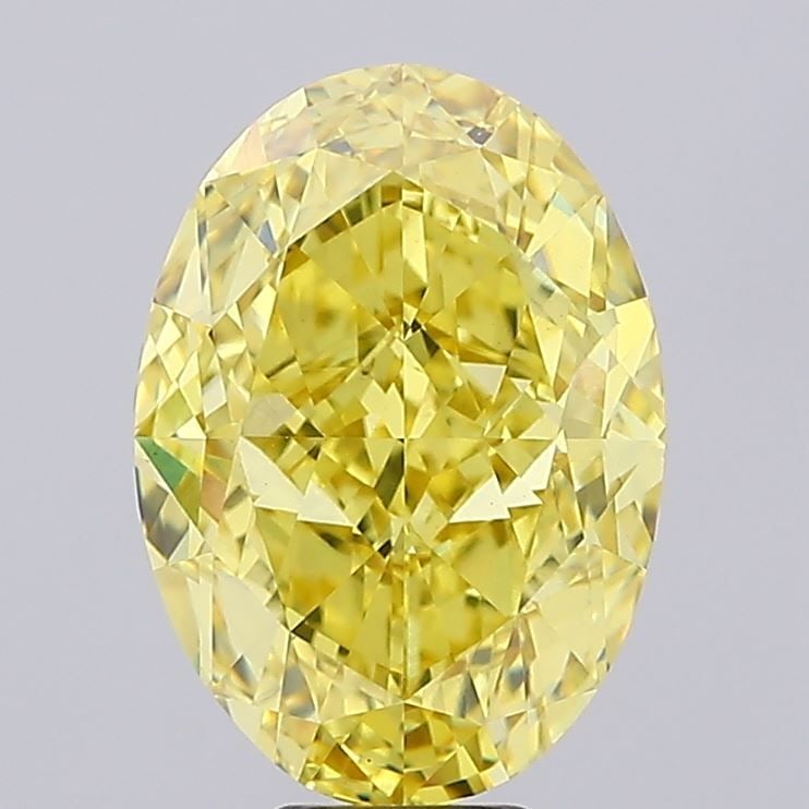 Loose Diamond - OVAL 12.68ct Fancy Vivid Yellow VS1: Loose Diamond - OVAL 12.68ct Fancy Vivid Yellow VS1 Source: This is a real non-mined Diamond that has been grown in a lab Shape: OVAL Carats: 12.68 Color: Fancy Vivid Yellow Certification: IGI Video: