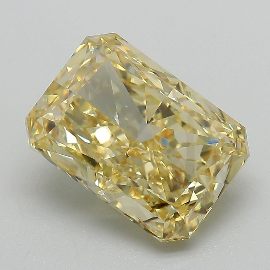 Loose Diamond - RADIANT 3.41ct Fancy Vivid Yellow VS2: Loose Diamond - RADIANT 3.41ct Fancy Vivid Yellow VS2 Source: This is a real non-mined Diamond that has been grown in a lab Shape: RADIANT Carats: 3.41 Color: Fancy Vivid Yellow Certification: IGI Vid