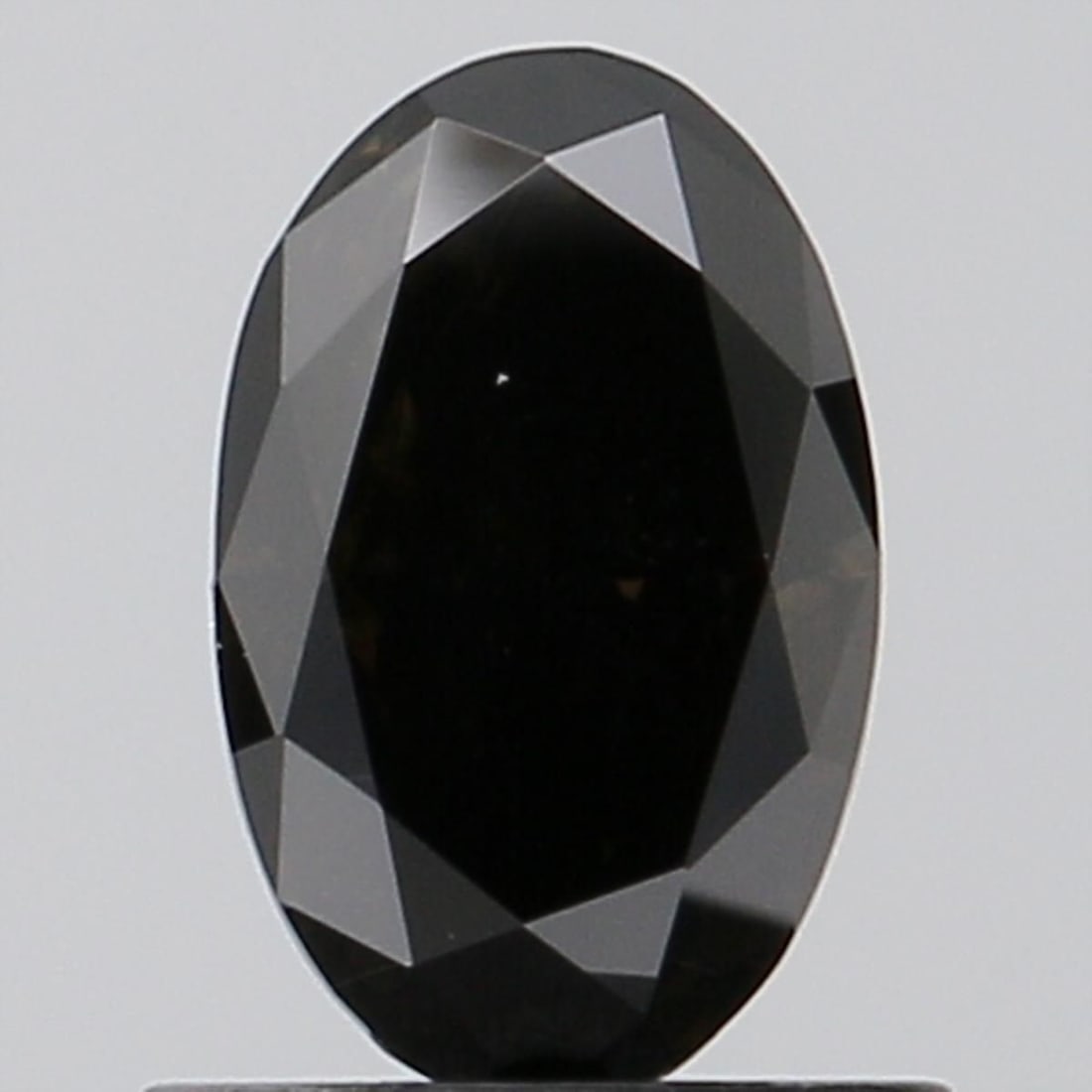 Loose Diamond - OVAL 0.99ct Fancy Deep Black VS2: Loose Diamond - OVAL 0.99ct Fancy Deep Black VS2 Source: This is a real non-mined Diamond that has been grown in a lab Shape: OVAL Carats: 0.99 Color: Fancy Deep Black Certification: NONE Video: