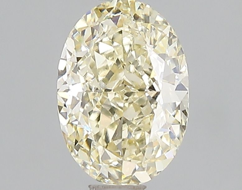 Loose Diamond - OVAL 1.52ct Fancy Yellow VS1: Loose Diamond - OVAL 1.52ct Fancy Yellow VS1 Source: This is a real non-mined Diamond that has been grown in a lab Shape: OVAL Carats: 1.52 Color: Fancy Yellow Certification: IGI Video: