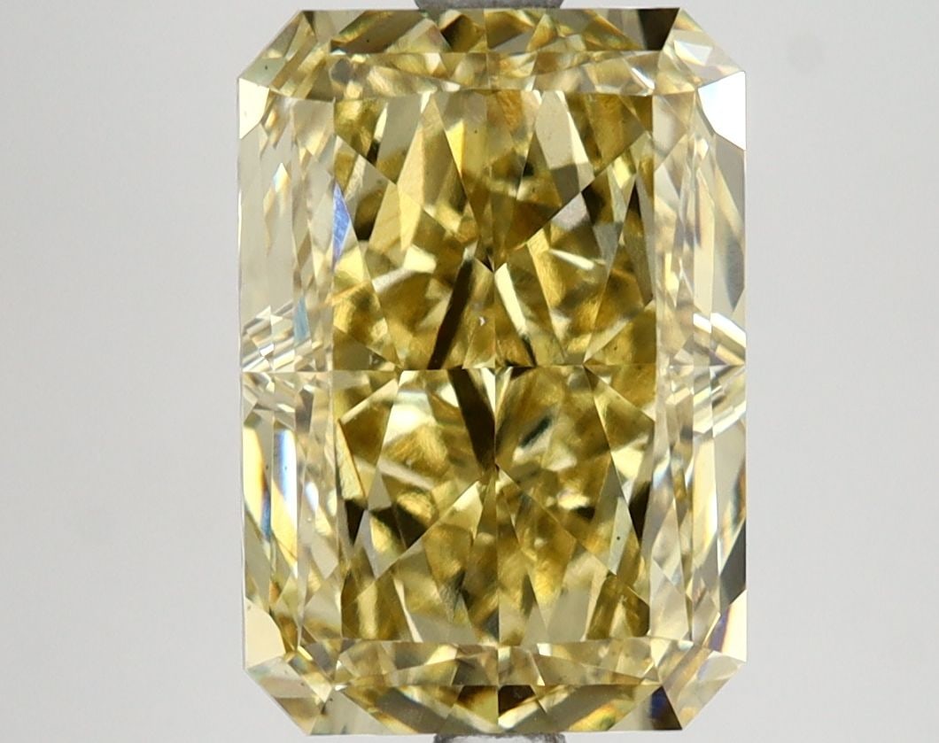 Loose Diamond - RADIANT 4.45ct Fancy Vivid Yellow VS1: Loose Diamond - RADIANT 4.45ct Fancy Vivid Yellow VS1 Source: This is a real non-mined Diamond that has been grown in a lab Shape: RADIANT Carats: 4.45 Color: Fancy Vivid Yellow Certification: IGI Vid
