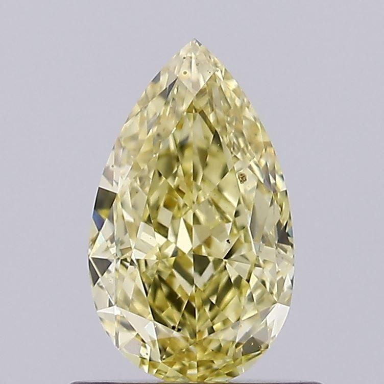 Loose Diamond - PEAR 0.82ct Fancy Intense Yellow VS2: Loose Diamond - PEAR 0.82ct Fancy Intense Yellow VS2 Source: This is a real non-mined Diamond that has been grown in a lab Shape: PEAR Carats: 0.82 Color: Fancy Intense Yellow Certification: IGI