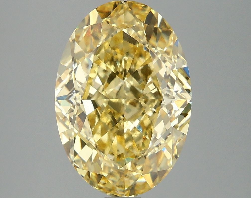 Loose Diamond - OVAL 4.15ct Fancy Vivid Yellow VVS2: Loose Diamond - OVAL 4.15ct Fancy Vivid Yellow VVS2 Source: This is a real non-mined Diamond that has been grown in a lab Shape: OVAL Carats: 4.15 Color: Fancy Vivid Yellow Certification: IGI Video: