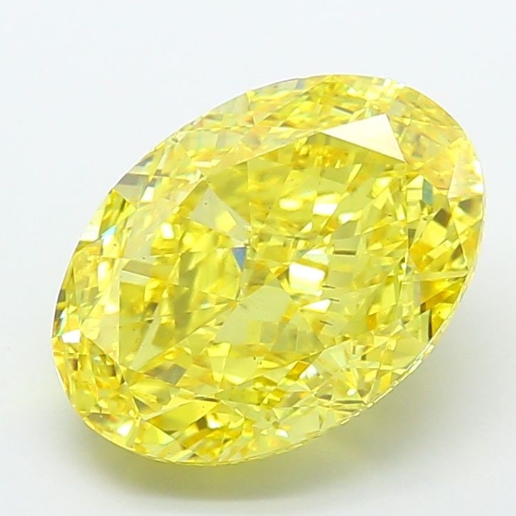 Loose Diamond - OVAL 9.7ct Fancy Vivid Yellow VS2: Loose Diamond - OVAL 9.7ct Fancy Vivid Yellow VS2 Source: This is a real non-mined Diamond that has been grown in a lab Shape: OVAL Carats: 9.7 Color: Fancy Vivid Yellow Certification: IGI Video: