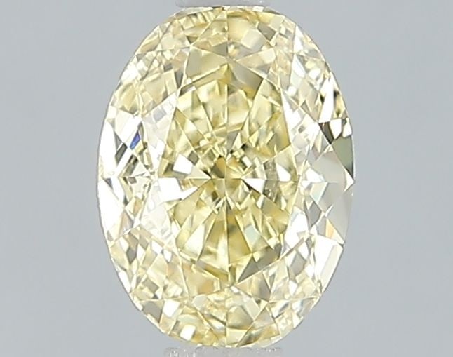 Loose Diamond - OVAL 1.02ct Fancy Vivid Yellow VS1: Loose Diamond - OVAL 1.02ct Fancy Vivid Yellow VS1 Source: This is a real non-mined Diamond that has been grown in a lab Shape: OVAL Carats: 1.02 Color: Fancy Vivid Yellow Certification: IGI Video: