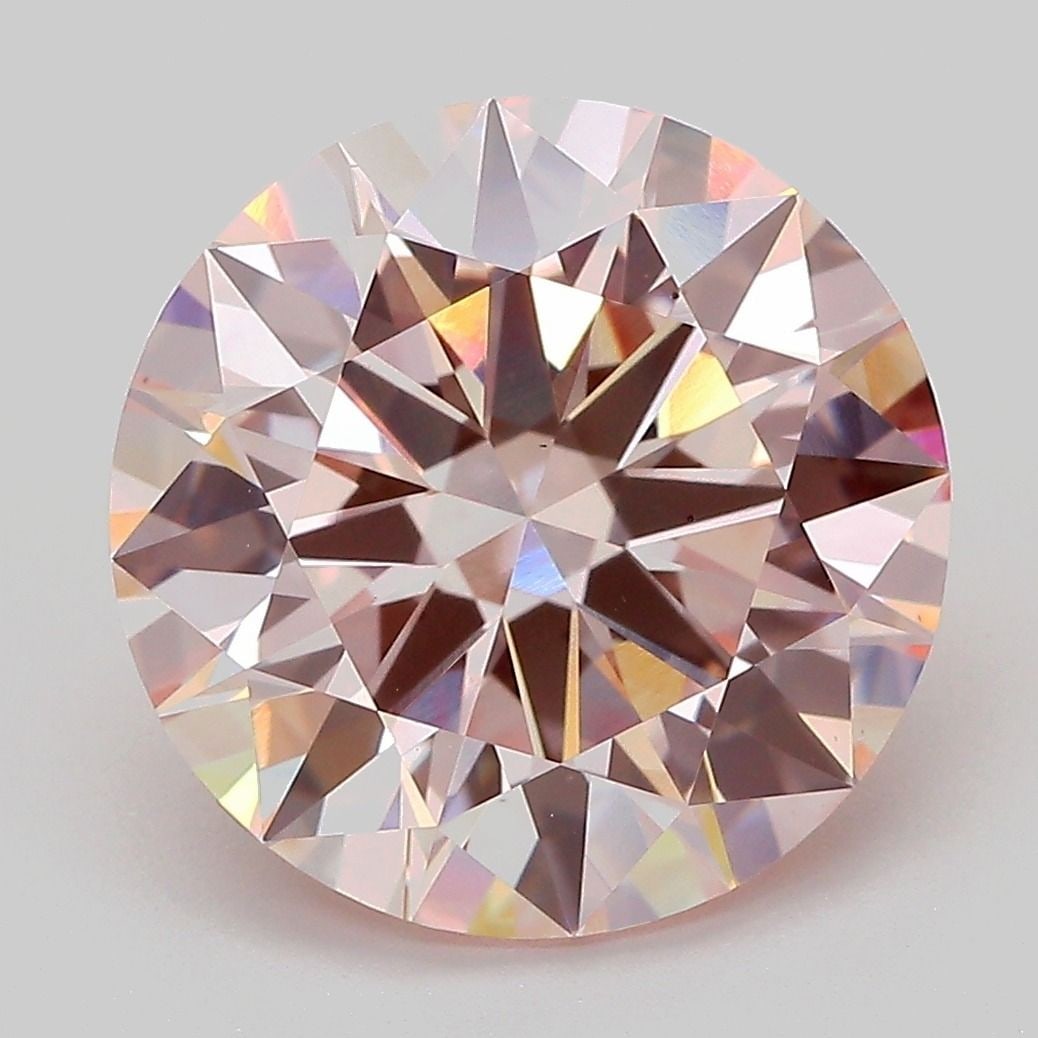 Loose Diamond - ROUND 6.07ct Fancy Pink VS2: Loose Diamond - ROUND 6.07ct Fancy Pink VS2 Source: This is a real non-mined Diamond that has been grown in a lab Shape: ROUND Carats: 6.07 Color: Fancy Pink Certification: IGI Video: