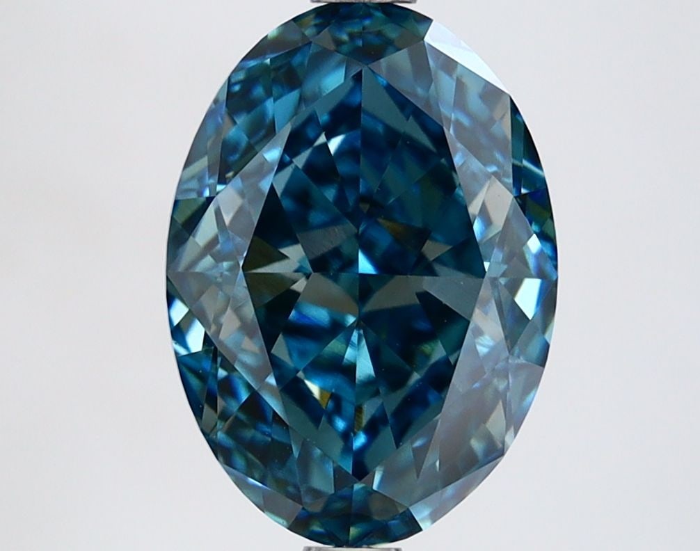 Loose Diamond - OVAL 3.27ct Fancy Vivid Blue VVS2: Loose Diamond - OVAL 3.27ct Fancy Vivid Blue VVS2 Source: This is a real non-mined Diamond that has been grown in a lab Shape: OVAL Carats: 3.27 Color: Fancy Vivid Blue Certification: IGI Video: