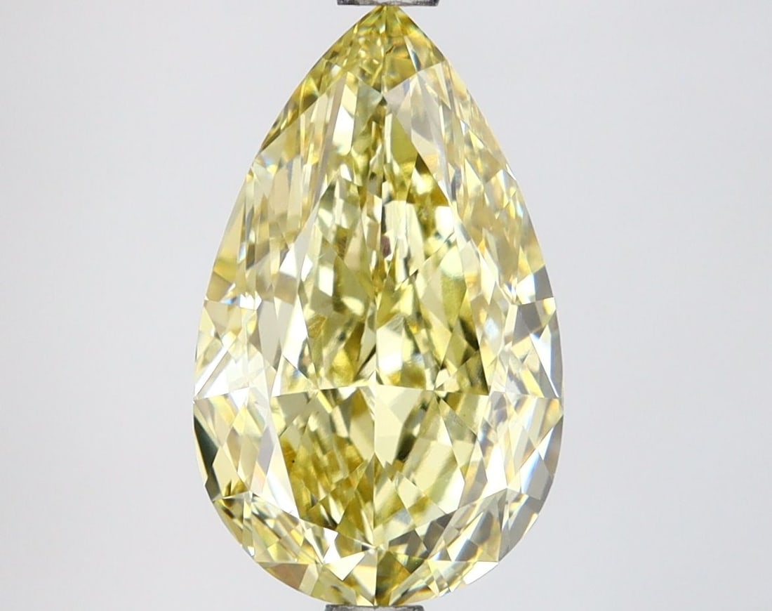 Loose Diamond - PEAR 3.75ct Fancy Yellow VS1: Loose Diamond - PEAR 3.75ct Fancy Yellow VS1 Source: This is a real non-mined Diamond that has been grown in a lab Shape: PEAR Carats: 3.75 Color: Fancy Yellow Certification: IGI Video: