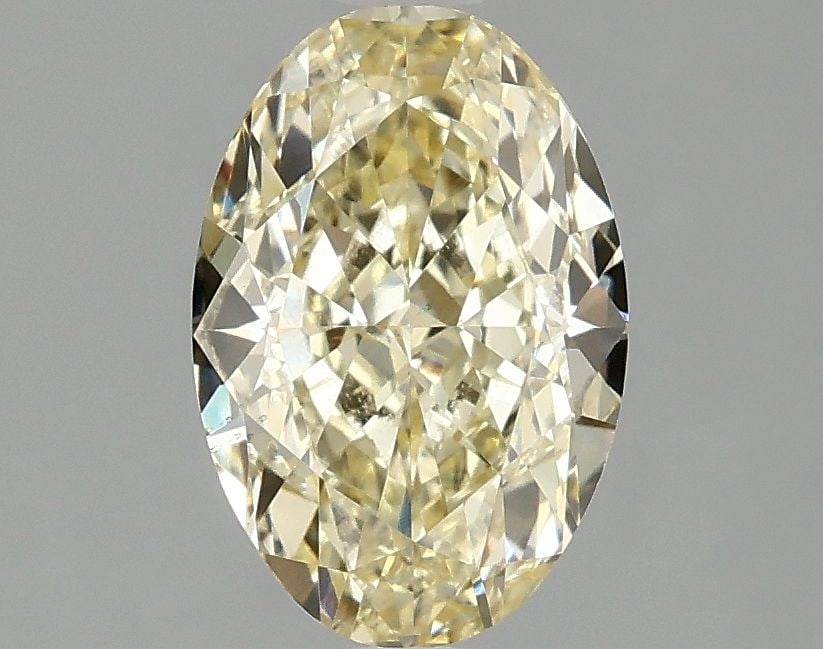 Loose Diamond - OVAL 2.06ct Fancy Intense Yellow VS2: Loose Diamond - OVAL 2.06ct Fancy Intense Yellow VS2 Source: This is a real non-mined Diamond that has been grown in a lab Shape: OVAL Carats: 2.06 Color: Fancy Intense Yellow Certification: IGI Video