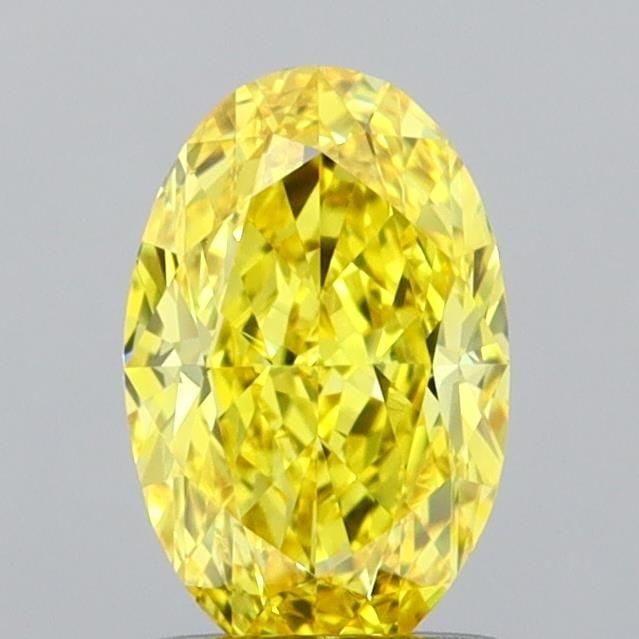Loose Diamond - OVAL 1.03ct Fancy Vivid Yellow VVS2: Loose Diamond - OVAL 1.03ct Fancy Vivid Yellow VVS2 Source: This is a real non-mined Diamond that has been grown in a lab Shape: OVAL Carats: 1.03 Color: Fancy Vivid Yellow Certification: IGI Video:
