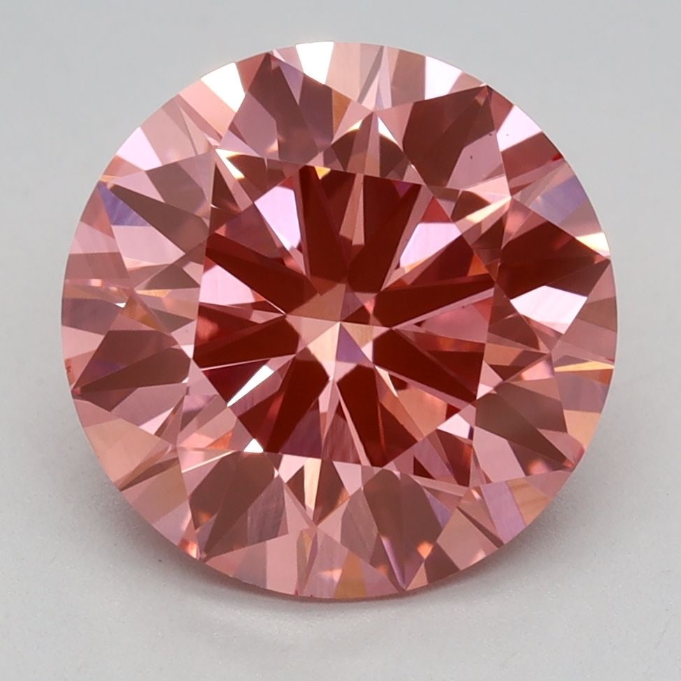Ideal Loose Diamond - ROUND 3.04ct Fancy Vivid Pink VS1: Ideal Loose Diamond - ROUND 3.04ct Fancy Vivid Pink VS1 Source: This is a real non-mined Diamond that has been grown in a lab Shape: ROUND Carats: 3.04 Color: Fancy Vivid Pink Certification: IGI