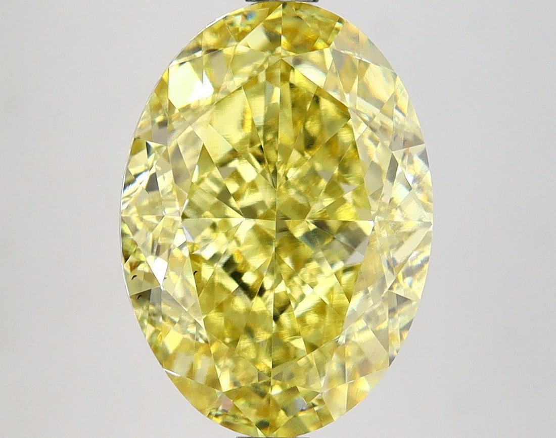Loose Diamond - OVAL 5.57ct Fancy Intense Yellow VS1: Loose Diamond - OVAL 5.57ct Fancy Intense Yellow VS1 Source: This is a real non-mined Diamond that has been grown in a lab Shape: OVAL Carats: 5.57 Color: Fancy Intense Yellow Certification: IGI Video