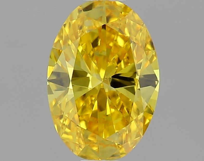 Loose Diamond - OVAL 0.65ct Fancy Vivid Yellow VS1: Loose Diamond - OVAL 0.65ct Fancy Vivid Yellow VS1 Source: This is a real non-mined Diamond that has been grown in a lab Shape: OVAL Carats: 0.65 Color: Fancy Vivid Yellow Certification: IGI Video: