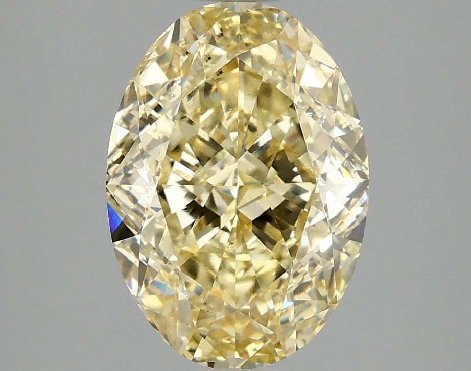 Loose Diamond - OVAL 3.08ct Fancy Intense Yellow VS2: Loose Diamond - OVAL 3.08ct Fancy Intense Yellow VS2 Source: This is a real non-mined Diamond that has been grown in a lab Shape: OVAL Carats: 3.08 Color: Fancy Intense Yellow Certification: IGI Video