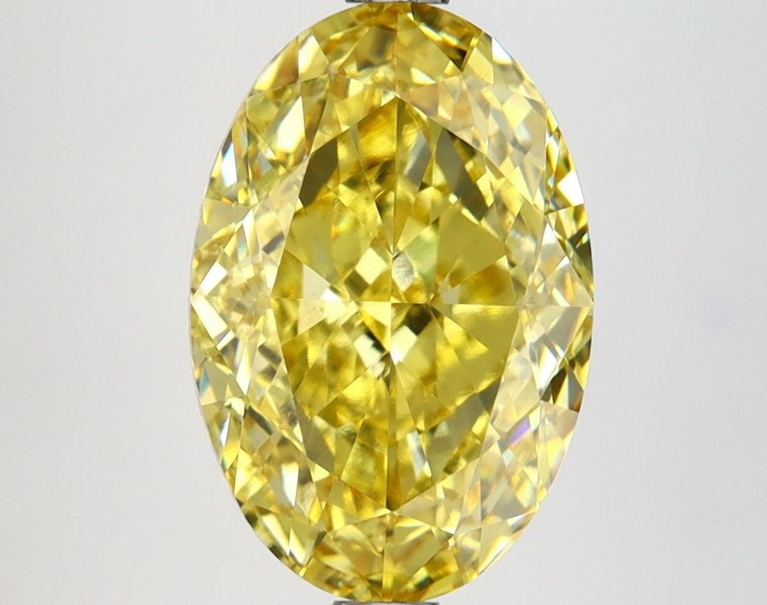 Loose Diamond - OVAL 3.86ct Fancy Vivid Yellow VVS2: Loose Diamond - OVAL 3.86ct Fancy Vivid Yellow VVS2 Source: This is a real non-mined Diamond that has been grown in a lab Shape: OVAL Carats: 3.86 Color: Fancy Vivid Yellow Certification: IGI Video:
