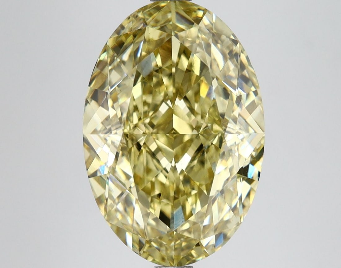 Loose Diamond - OVAL 5.72ct Fancy Vivid Yellow VS1: Loose Diamond - OVAL 5.72ct Fancy Vivid Yellow VS1 Source: This is a real non-mined Diamond that has been grown in a lab Shape: OVAL Carats: 5.72 Color: Fancy Vivid Yellow Certification: IGI Video: