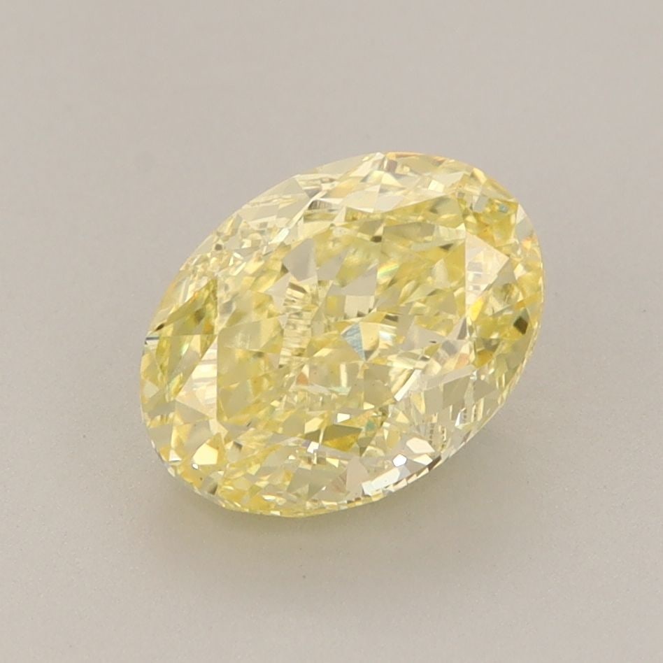 Loose Diamond - OVAL 2.09ct Fancy Vivid Yellow VS2: Loose Diamond - OVAL 2.09ct Fancy Vivid Yellow VS2 Source: This is a real non-mined Diamond that has been grown in a lab Shape: OVAL Carats: 2.09 Color: Fancy Vivid Yellow Certification: IGI Video: