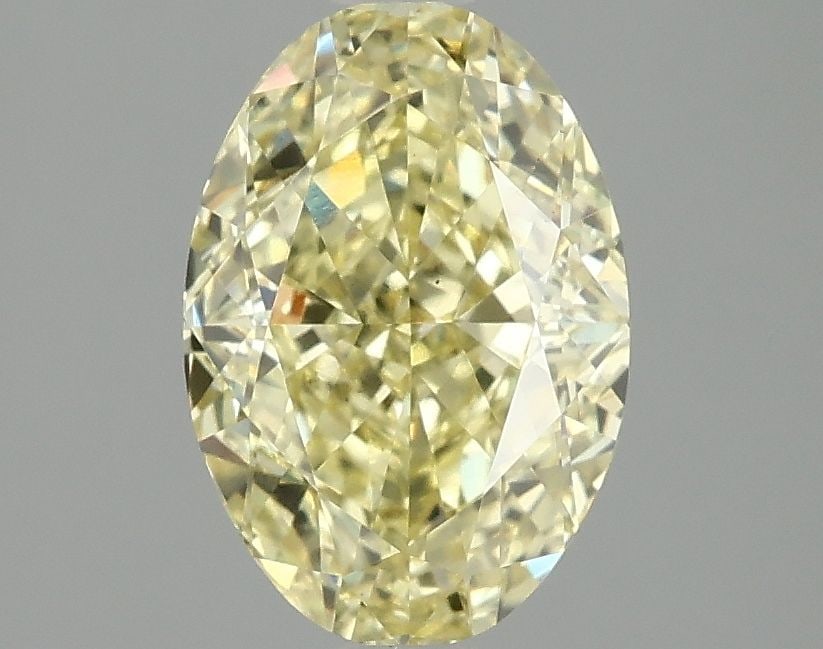 Loose Diamond - OVAL 2.1ct Fancy Vivid Yellow VS2: Loose Diamond - OVAL 2.1ct Fancy Vivid Yellow VS2 Source: This is a real non-mined Diamond that has been grown in a lab Shape: OVAL Carats: 2.1 Color: Fancy Vivid Yellow Certification: IGI Video: