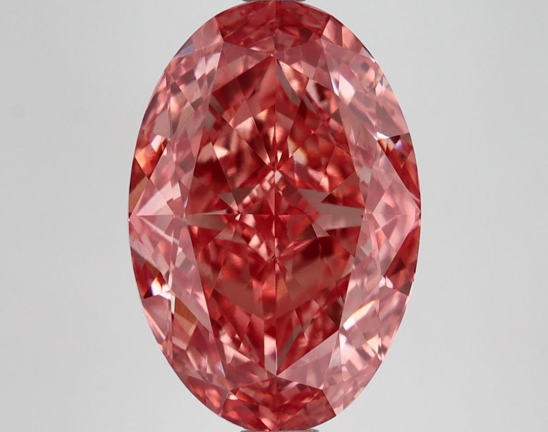 Loose Diamond - OVAL 6.07ct Fancy Vivid Pink VVS2: Loose Diamond - OVAL 6.07ct Fancy Vivid Pink VVS2 Source: This is a real non-mined Diamond that has been grown in a lab Shape: OVAL Carats: 6.07 Color: Fancy Vivid Pink Certification: IGI Video: