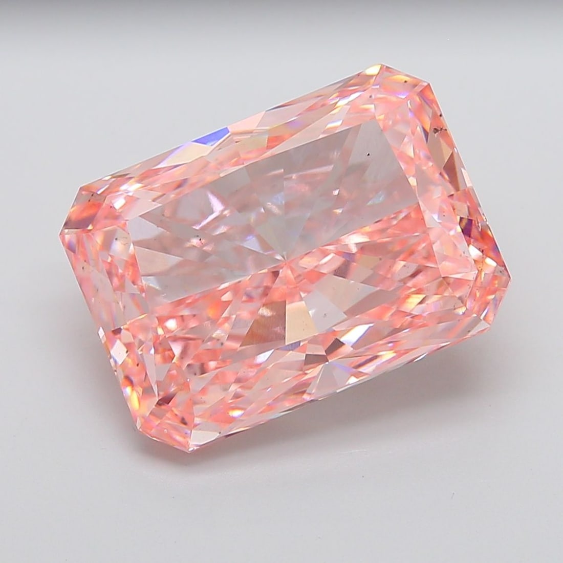 Loose Diamond - RADIANT 19.09ct Fancy Vivid Pink VS2: Loose Diamond - RADIANT 19.09ct Fancy Vivid Pink VS2 Source: This is a real non-mined Diamond that has been grown in a lab Shape: RADIANT Carats: 19.09 Color: Fancy Vivid Pink Certification: IGI Video