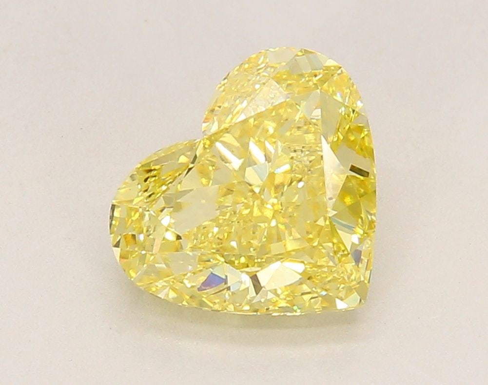 Loose Diamond - HEART 3.03ct Fancy Intense Yellow VS1: Loose Diamond - HEART 3.03ct Fancy Intense Yellow VS1 Source: This is a real non-mined Diamond that has been grown in a lab Shape: HEART Carats: 3.03 Color: Fancy Intense Yellow Certification: IGI Vid