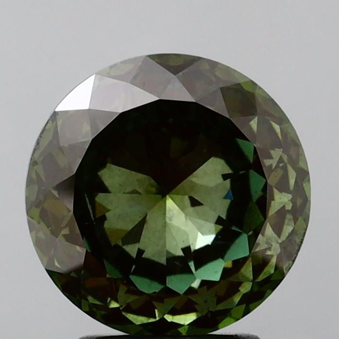 Loose Diamond - ROUND 3.04ct Fancy Vivid Green VS2: Loose Diamond - ROUND 3.04ct Fancy Vivid Green VS2 Source: This is a real non-mined Diamond that has been grown in a lab Shape: ROUND Carats: 3.04 Color: Fancy Vivid Green Certification: NONE Video: