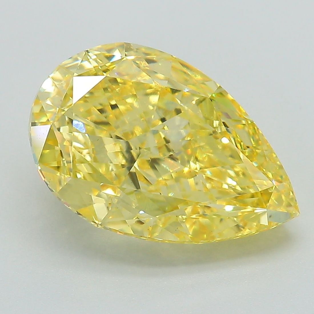 Loose Diamond - PEAR 6.18ct Fancy Vivid Yellow VS1: Loose Diamond - PEAR 6.18ct Fancy Vivid Yellow VS1 Source: This is a real non-mined Diamond that has been grown in a lab Shape: PEAR Carats: 6.18 Color: Fancy Vivid Yellow Certification: IGI Video: