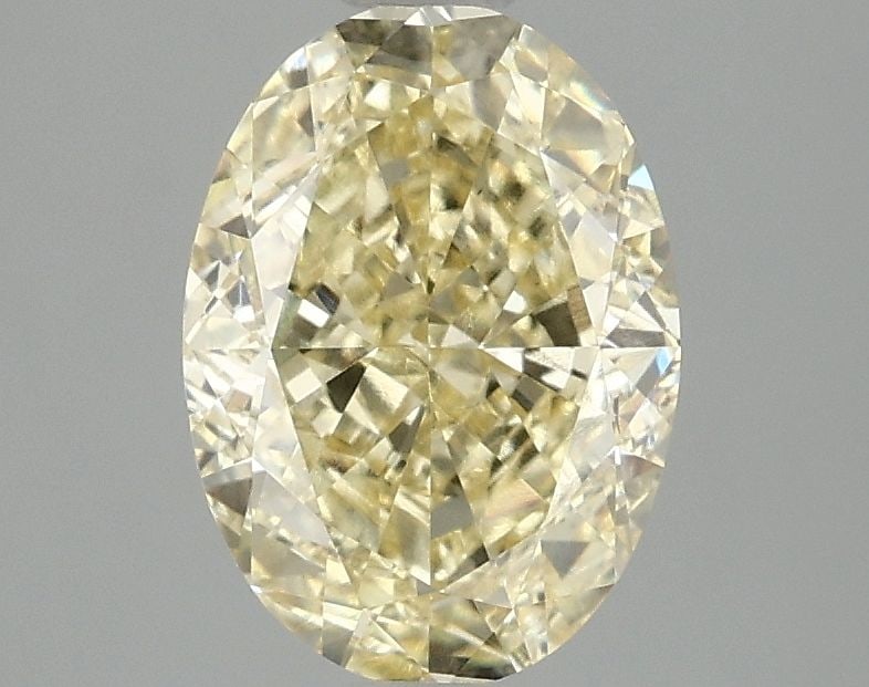 Loose Diamond - OVAL 2.1ct Fancy Vivid Yellow VS1: Loose Diamond - OVAL 2.1ct Fancy Vivid Yellow VS1 Source: This is a real non-mined Diamond that has been grown in a lab Shape: OVAL Carats: 2.1 Color: Fancy Vivid Yellow Certification: IGI Video: