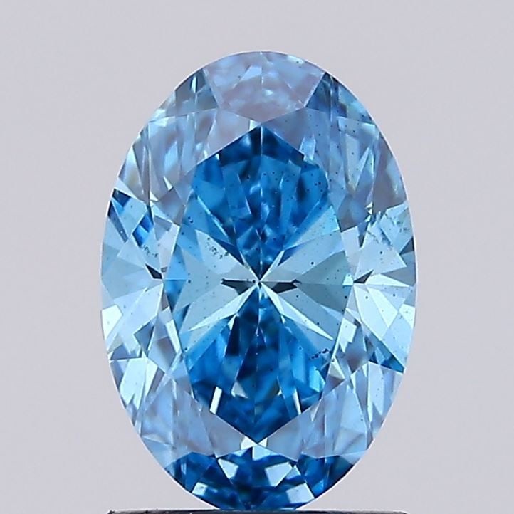 Loose Diamond - OVAL 1.54ct Fancy Vivid Blue SI1: Loose Diamond - OVAL 1.54ct Fancy Vivid Blue SI1 Source: This is a real non-mined Diamond that has been grown in a lab Shape: OVAL Carats: 1.54 Color: Fancy Vivid Blue Certification: IGI Video: