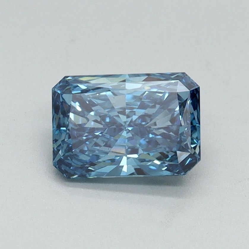 Loose Diamond - RADIANT 0.93ct Fancy Vivid Blue VS2: Loose Diamond - RADIANT 0.93ct Fancy Vivid Blue VS2 Source: This is a real non-mined Diamond that has been grown in a lab Shape: RADIANT Carats: 0.93 Color: Fancy Vivid Blue Certification: IGI Video: