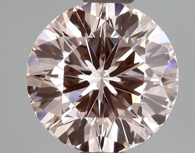 Loose Diamond - ROUND 2.03ct Fancy Pink VS1: Loose Diamond - ROUND 2.03ct Fancy Pink VS1 Source: This is a real non-mined Diamond that has been grown in a lab Shape: ROUND Carats: 2.03 Color: Fancy Pink Certification: IGI Video: