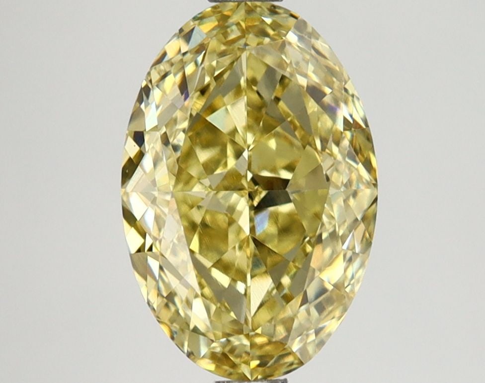 Loose Diamond - OVAL 2.57ct Fancy Vivid Yellow VS1: Loose Diamond - OVAL 2.57ct Fancy Vivid Yellow VS1 Source: This is a real non-mined Diamond that has been grown in a lab Shape: OVAL Carats: 2.57 Color: Fancy Vivid Yellow Certification: IGI Video: