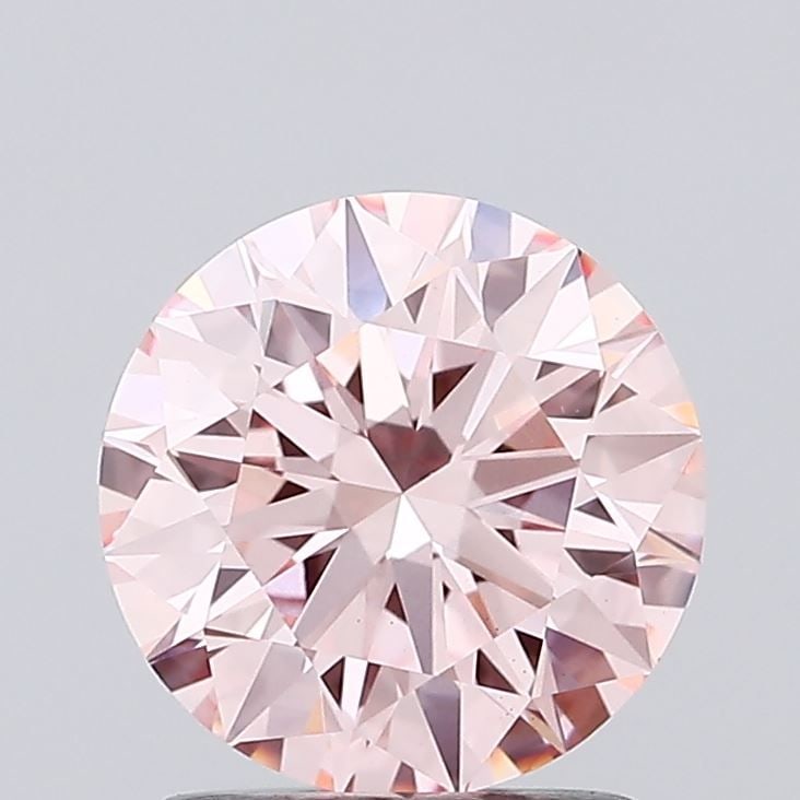 Ideal Loose Diamond - ROUND 1.57ct Fancy Vivid Pink VS1: Ideal Loose Diamond - ROUND 1.57ct Fancy Vivid Pink VS1 Source: This is a real non-mined Diamond that has been grown in a lab Shape: ROUND Carats: 1.57 Color: Fancy Vivid Pink Certification: IGI Video