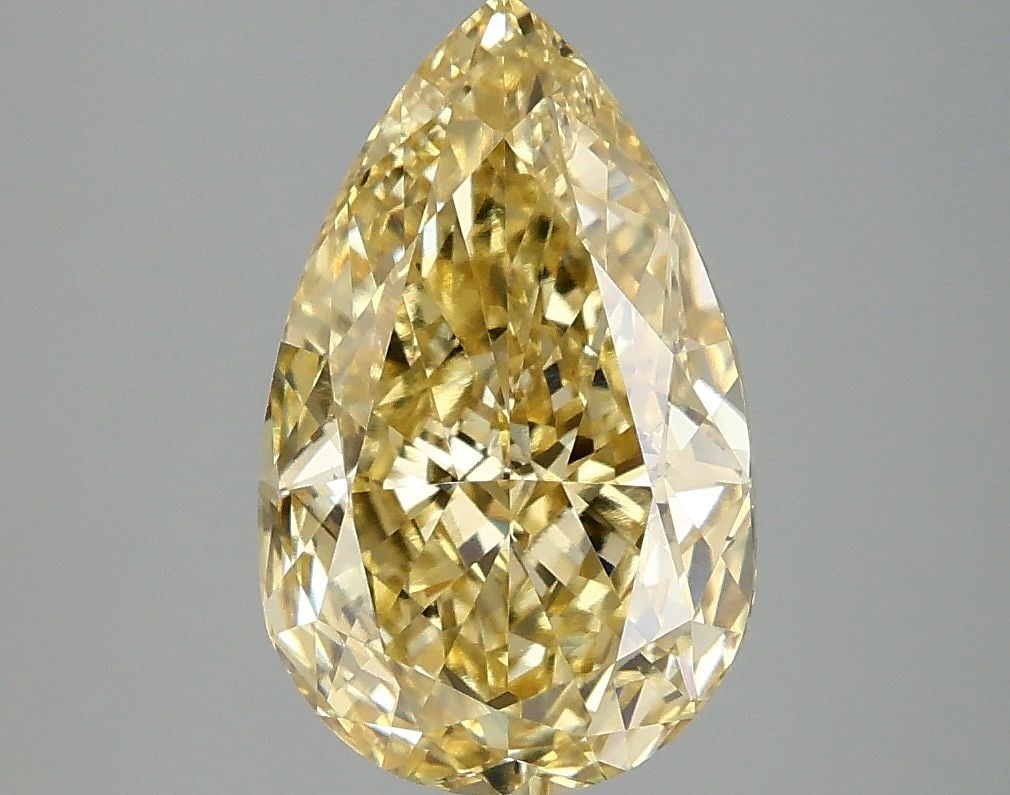 Loose Diamond - PEAR 3.04ct Fancy Vivid Yellow VS1: Loose Diamond - PEAR 3.04ct Fancy Vivid Yellow VS1 Source: This is a real non-mined Diamond that has been grown in a lab Shape: PEAR Carats: 3.04 Color: Fancy Vivid Yellow Certification: IGI Video: