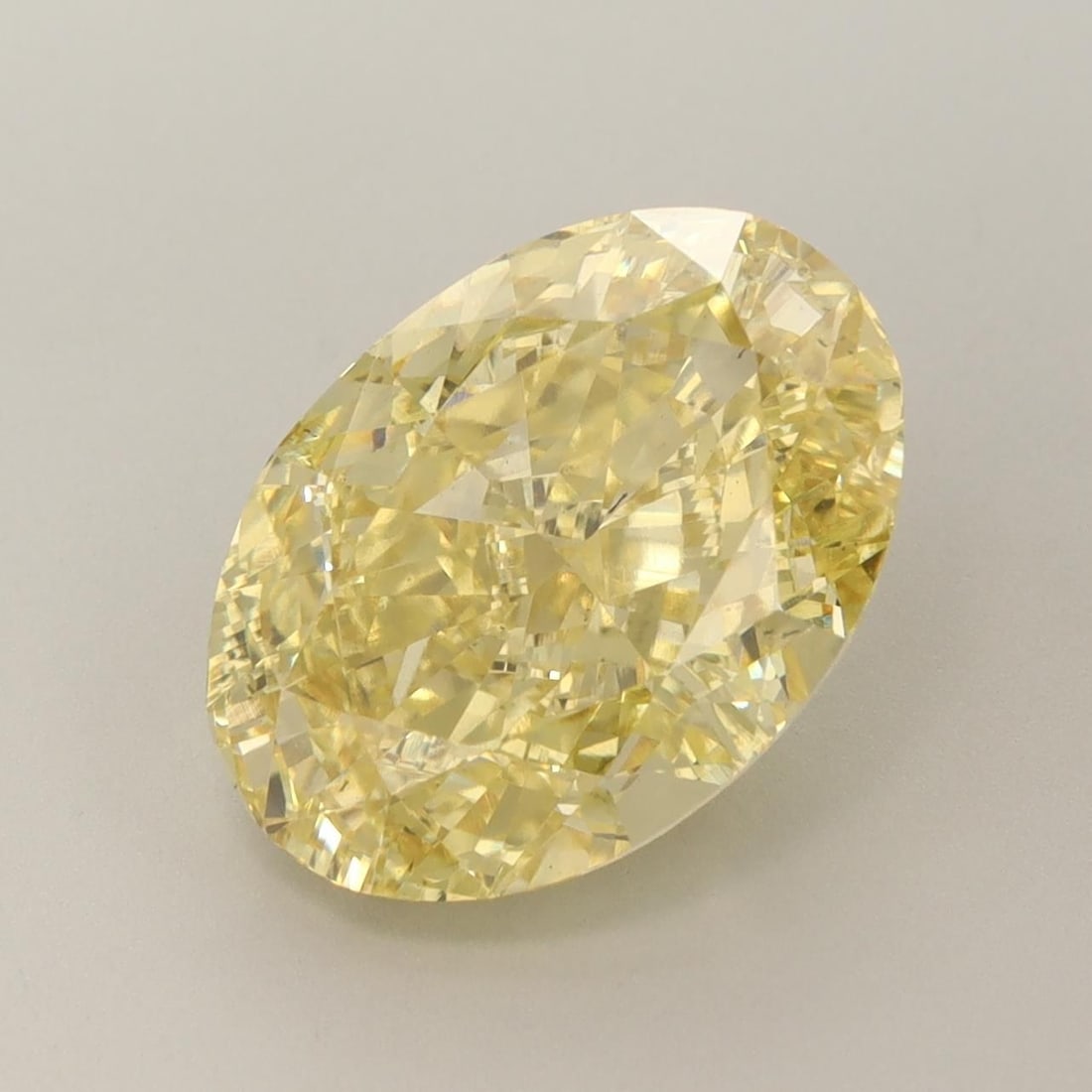 Loose Diamond - OVAL 6.32ct Fancy Vivid Yellow VS1: Loose Diamond - OVAL 6.32ct Fancy Vivid Yellow VS1 Source: This is a real non-mined Diamond that has been grown in a lab Shape: OVAL Carats: 6.32 Color: Fancy Vivid Yellow Certification: IGI Video: