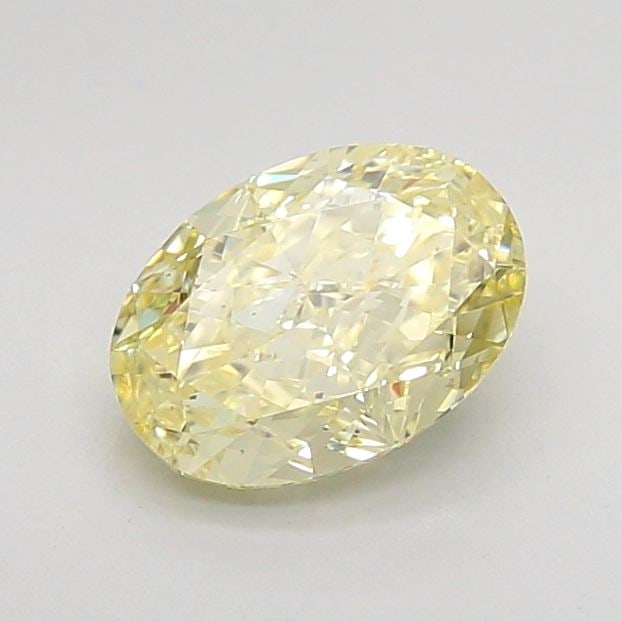 Loose Diamond - OVAL 1.02ct Fancy Light Yellow VS2: Loose Diamond - OVAL 1.02ct Fancy Light Yellow VS2 Source: This is a real non-mined Diamond that has been grown in a lab Shape: OVAL Carats: 1.02 Color: Fancy Light Yellow Certification: IGI Video: