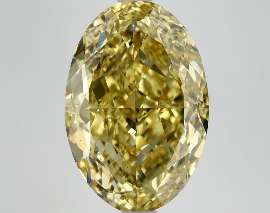 Loose Diamond - OVAL 6.01ct Fancy Vivid Yellow VS2: Loose Diamond - OVAL 6.01ct Fancy Vivid Yellow VS2 Source: This is a real non-mined Diamond that has been grown in a lab Shape: OVAL Carats: 6.01 Color: Fancy Vivid Yellow Certification: IGI Video: