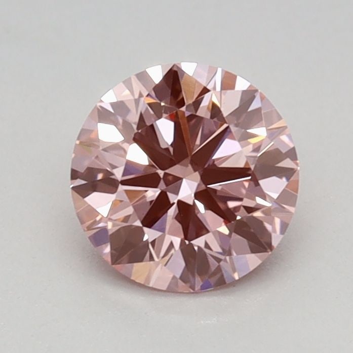 Ideal Loose Diamond - ROUND 0.57ct Fancy Vivid Pink VS1: Ideal Loose Diamond - ROUND 0.57ct Fancy Vivid Pink VS1 Source: This is a real non-mined Diamond that has been grown in a lab Shape: ROUND Carats: 0.57 Color: Fancy Vivid Pink Certification: IGI Video