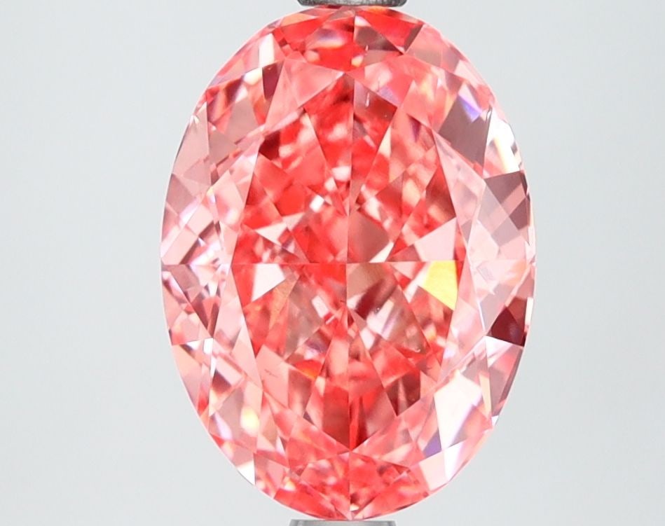 Loose Diamond - OVAL 2.58ct Fancy Vivid Pink VS2: Loose Diamond - OVAL 2.58ct Fancy Vivid Pink VS2 Source: This is a real non-mined Diamond that has been grown in a lab Shape: OVAL Carats: 2.58 Color: Fancy Vivid Pink Certification: IGI Video: