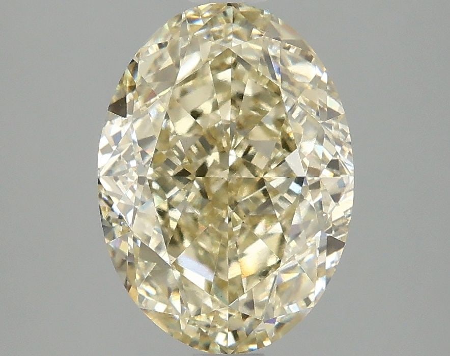 Loose Diamond - OVAL 3.1ct Fancy Light Yellow VS2: Loose Diamond - OVAL 3.1ct Fancy Light Yellow VS2 Source: This is a real non-mined Diamond that has been grown in a lab Shape: OVAL Carats: 3.1 Color: Fancy Light Yellow Certification: IGI Video: