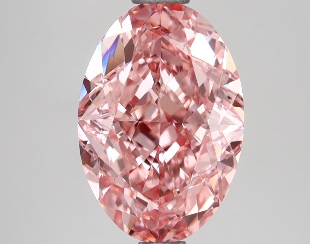 Loose Diamond - OVAL 2.59ct Fancy Vivid Pink VS1: Loose Diamond - OVAL 2.59ct Fancy Vivid Pink VS1 Source: This is a real non-mined Diamond that has been grown in a lab Shape: OVAL Carats: 2.59 Color: Fancy Vivid Pink Certification: IGI Video: