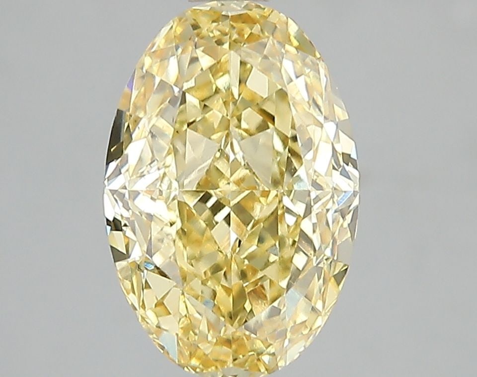 Loose Diamond - OVAL 3.01ct Fancy Vivid Yellow VS1: Loose Diamond - OVAL 3.01ct Fancy Vivid Yellow VS1 Source: This is a real non-mined Diamond that has been grown in a lab Shape: OVAL Carats: 3.01 Color: Fancy Vivid Yellow Certification: IGI Video: