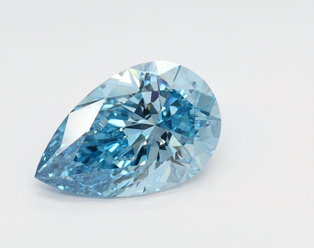 Loose Diamond - PEAR 1.62ct Fancy Vivid Blue VS1: Loose Diamond - PEAR 1.62ct Fancy Vivid Blue VS1 Source: This is a real non-mined Diamond that has been grown in a lab Shape: PEAR Carats: 1.62 Color: Fancy Vivid Blue Certification: IGI Video: