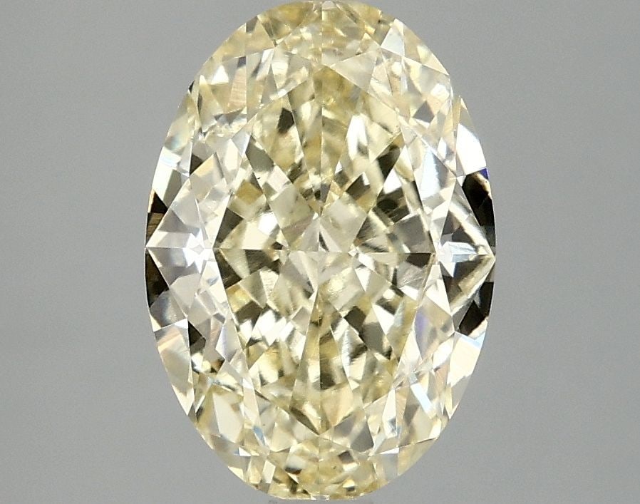Loose Diamond - OVAL 3.09ct Fancy Intense Yellow VS1: Loose Diamond - OVAL 3.09ct Fancy Intense Yellow VS1 Source: This is a real non-mined Diamond that has been grown in a lab Shape: OVAL Carats: 3.09 Color: Fancy Intense Yellow Certification: IGI Video