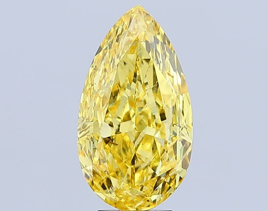 Loose Diamond - PEAR 5.38ct Fancy Vivid Yellow VS2: Loose Diamond - PEAR 5.38ct Fancy Vivid Yellow VS2 Source: This is a real non-mined Diamond that has been grown in a lab Shape: PEAR Carats: 5.38 Color: Fancy Vivid Yellow Certification: IGI Video: