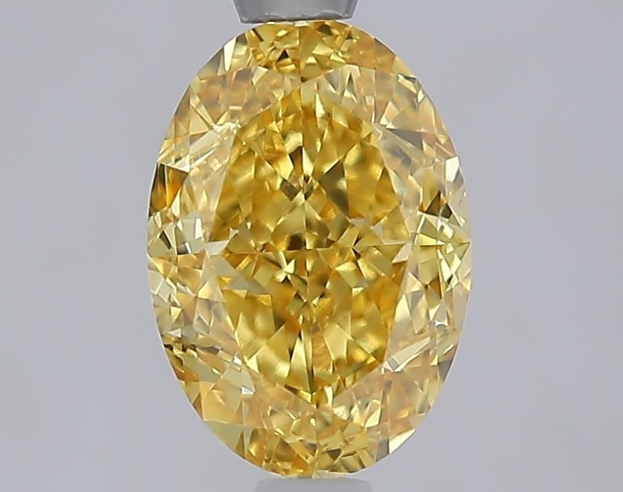 Loose Diamond - OVAL 2.09ct Fancy Vivid Yellow VVS2: Loose Diamond - OVAL 2.09ct Fancy Vivid Yellow VVS2 Source: This is a real non-mined Diamond that has been grown in a lab Shape: OVAL Carats: 2.09 Color: Fancy Vivid Yellow Certification: IGI Video: